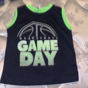 A navy blue and neon green tank top